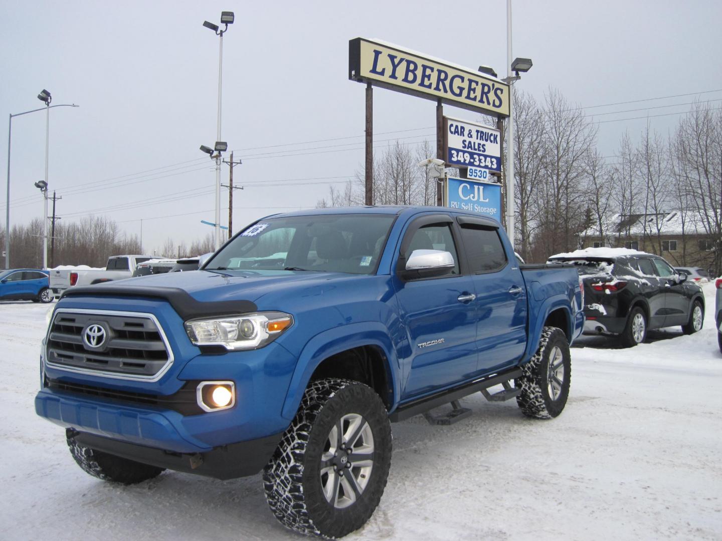 2016 blue /brown Toyota Tacoma Limited Double Cab V6 6AT 4WD (5TFGZ5AN7GX) with an 3.6L V6 DOHC 24V engine, 5A transmission, located at 9530 Old Seward Highway, Anchorage, AK, 99515, (907) 349-3343, 61.134140, -149.865570 - Really Nice Toyot Tacoma! - Photo#0